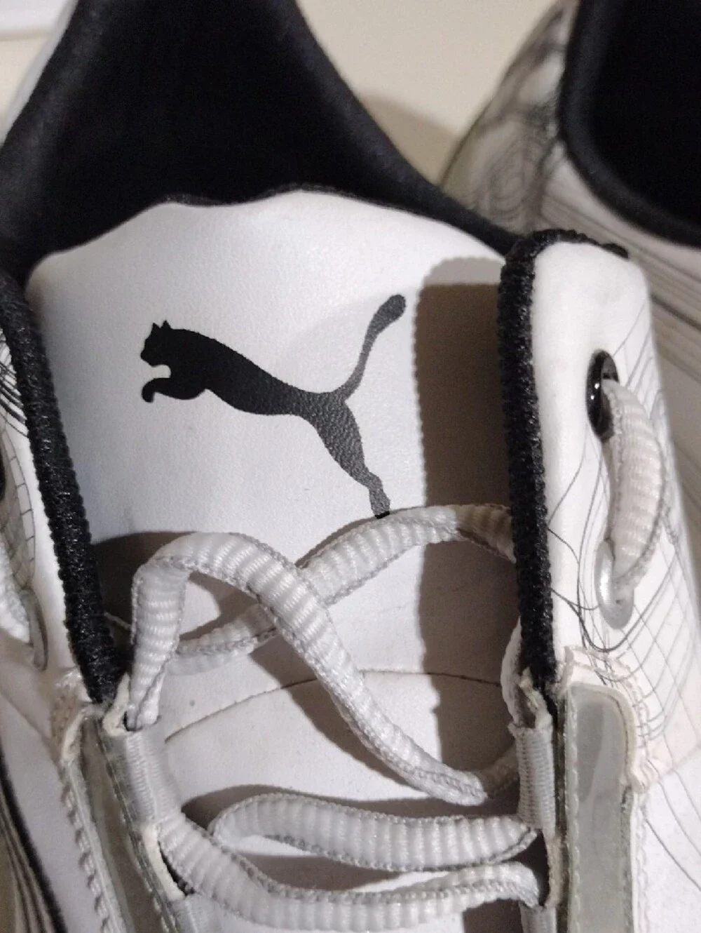 Men's Puma Future Cat S1 White Sneakers with Black Logos and Graphic Details